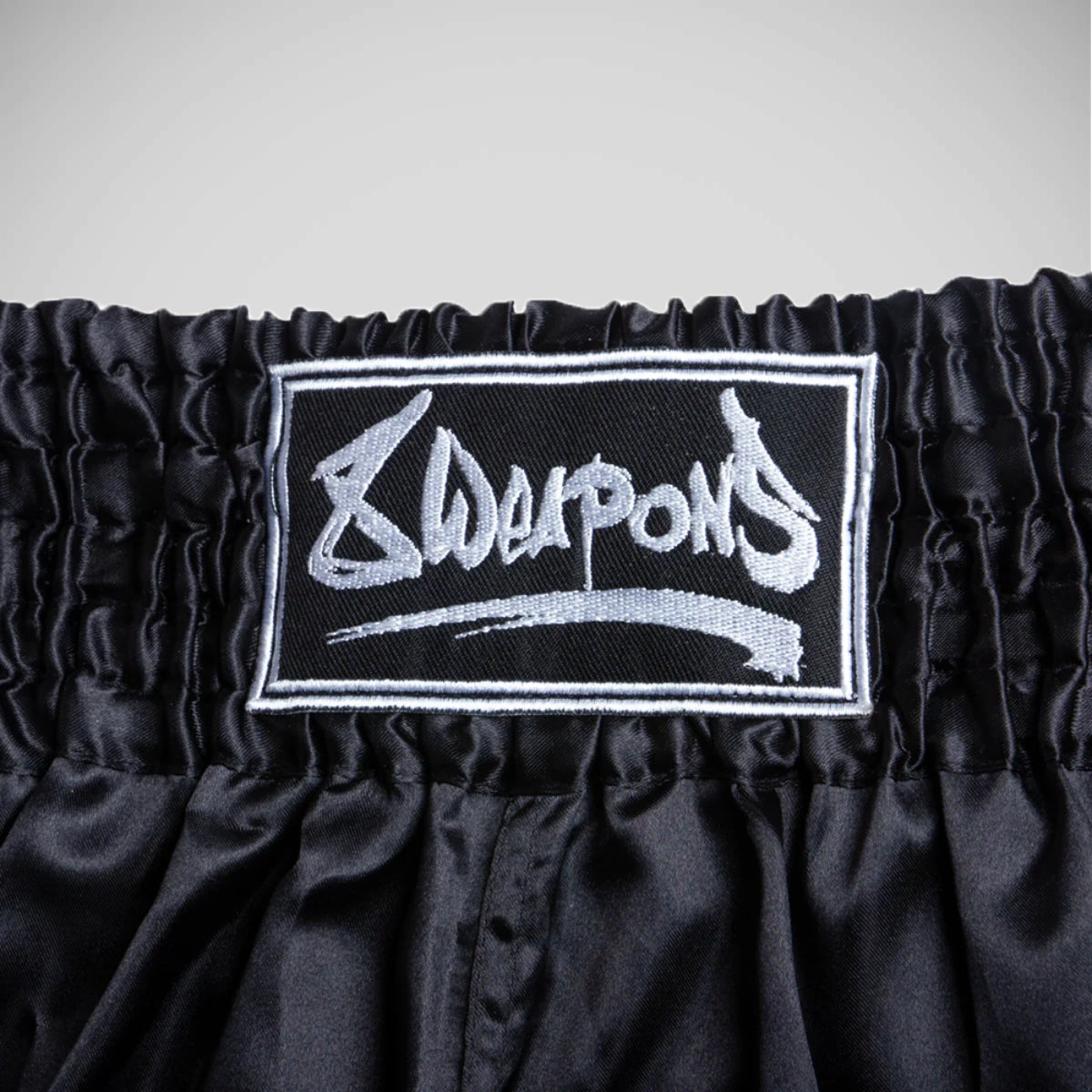 8 Weapons Strike Muay Thai Shorts Black/White