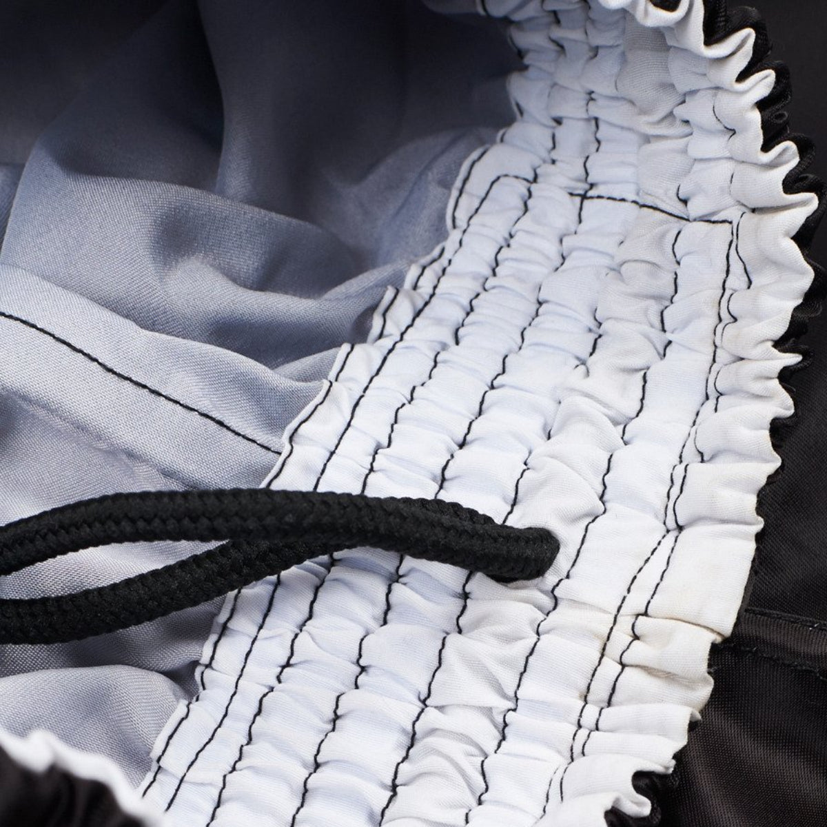 Manto Muay Thai dual muay thai short preto/prata