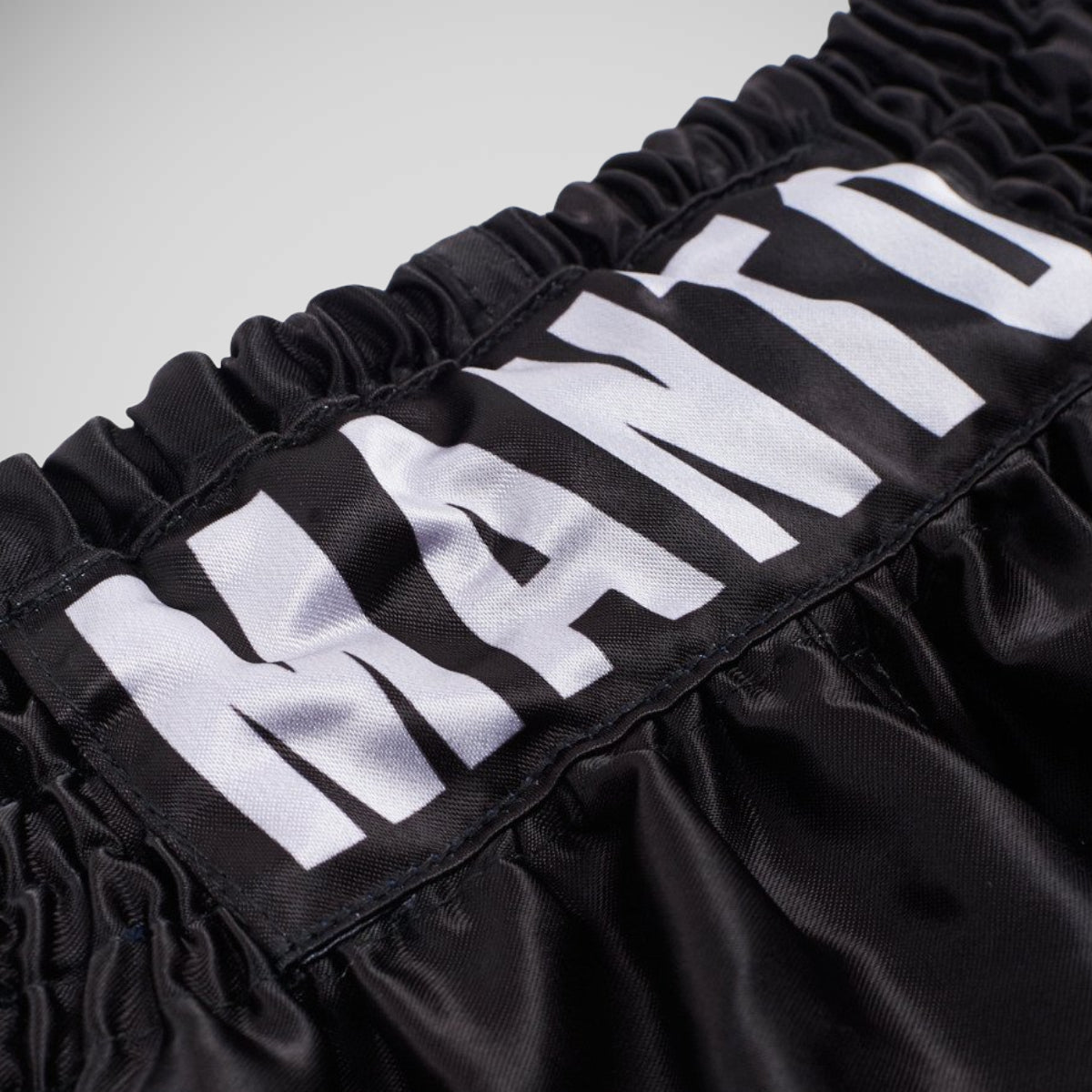Manto Muay Thai dual muay thai short preto/prata