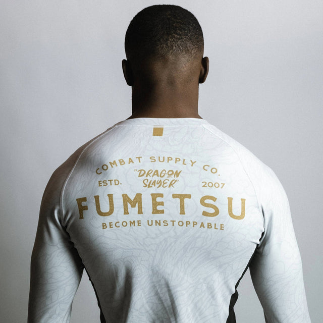 Fumetsu Dragon Slayer Long Sleeve Rash Guard White/Black/Gold