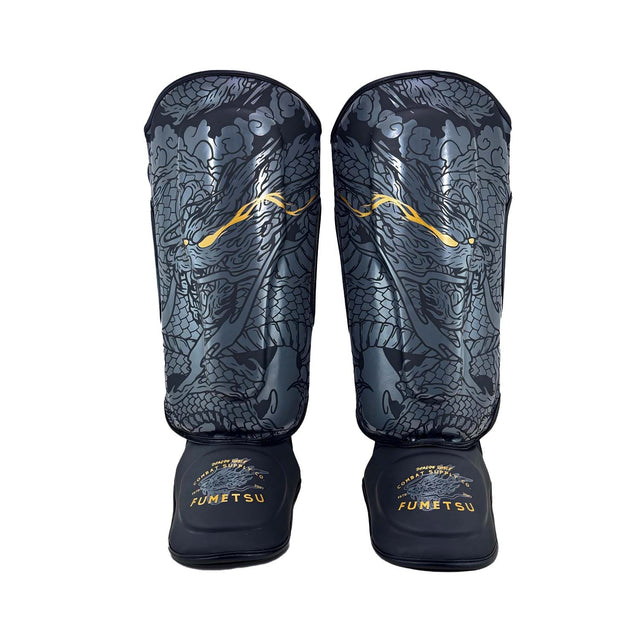 Fumetsu Dragon Slayer Shin Guards Black/Gold