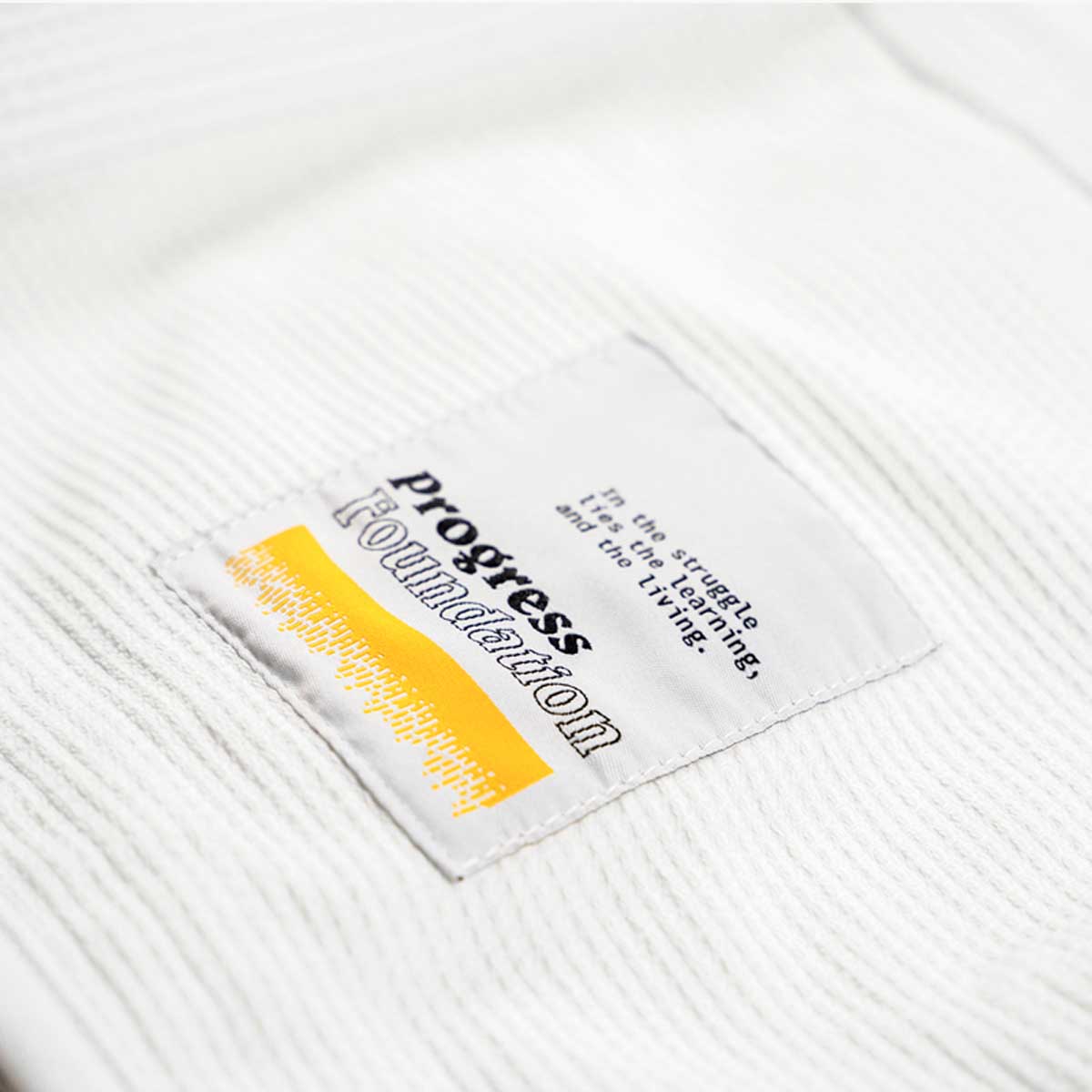 Fremgang stiftelsen tre BJJ Gi White