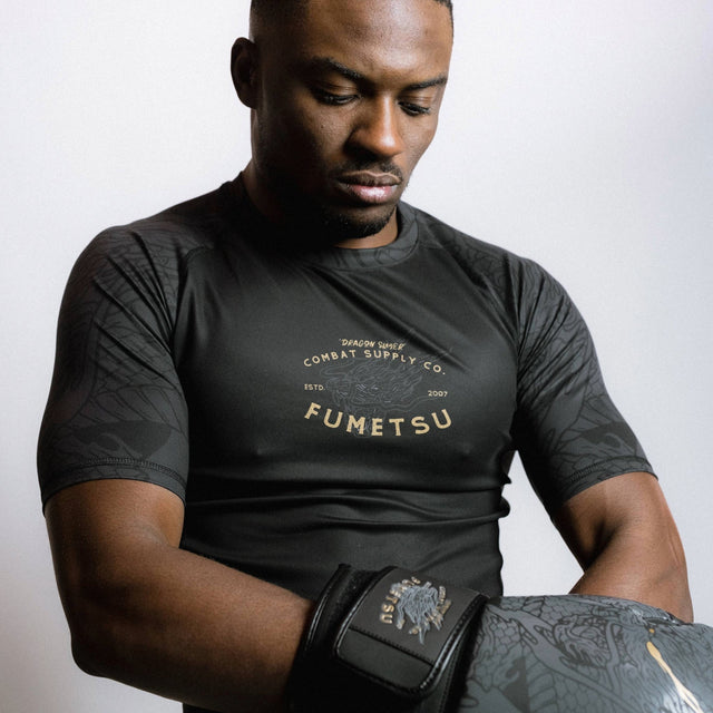 Fumetsu Dragon Slayer Short Sleeve Rash Guard Black/Gold