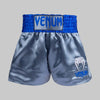 Venum Pantalones cortos clásicos de muay thai gris