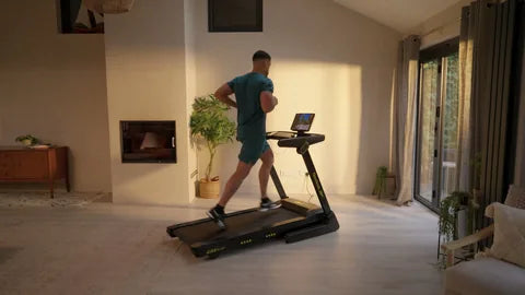 Runner training on a Reebok treadmill
