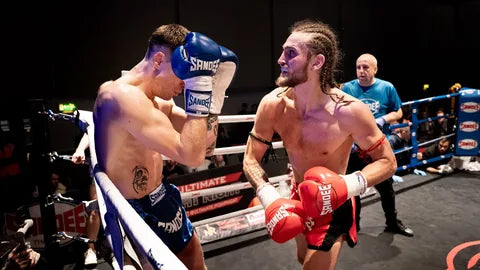 Muay Thai fighters using Sandee gloves in the ring