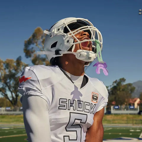 Athlete wearing a Shock Doctor mouthguard