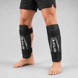 Black/White Bytomic Axis V2 Shin Guards Lifestyle 3