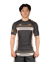 Scramble Duotone Rash Guard Black in black, stone and orange, front view
