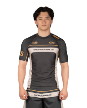 Scramble Duotone Rash Guard Black in black, stone and orange, front view