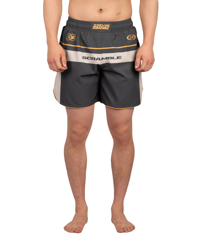 Scramble Duotone Grappling Shorts Black in black, stone and orange, front view