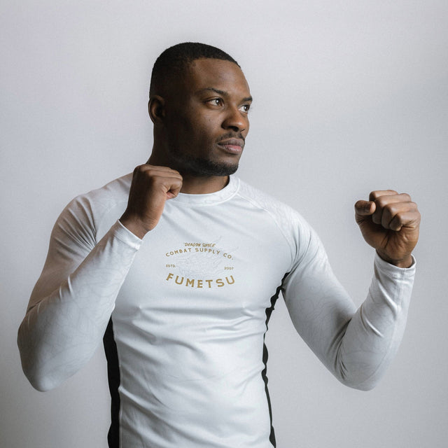 Fumetsu Dragon Slayer Long Sleeve Rash Guard White/Black/Gold