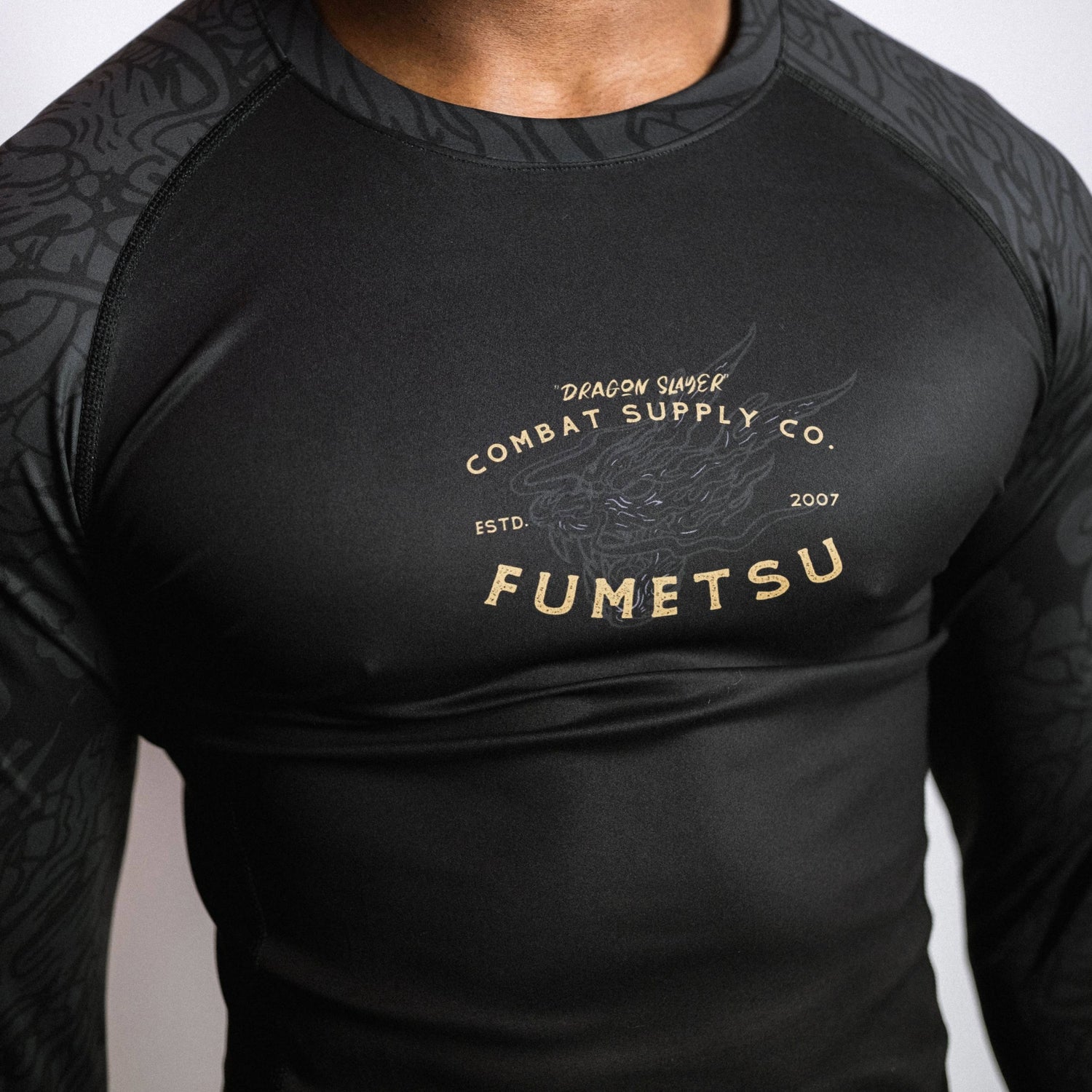 Fumetsu Dragon Slayer Long Sleeve Rash Guard Black/Gold from Made4Fighters