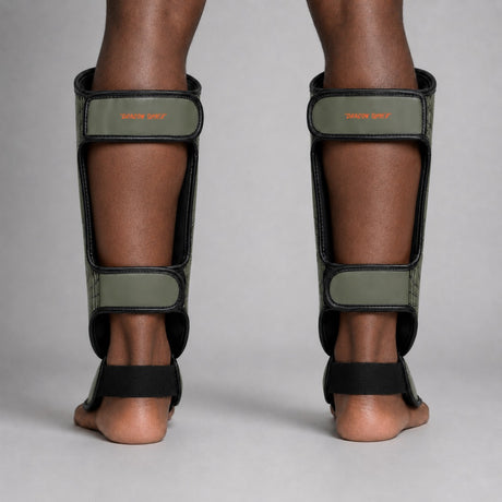 Fumetsu Dragon Slayer Shin Guards Khaki/Orange Lifestyle 2