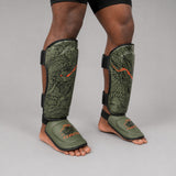 Fumetsu Dragon Slayer Shin Guards Khaki/Orange Lifestyle 3