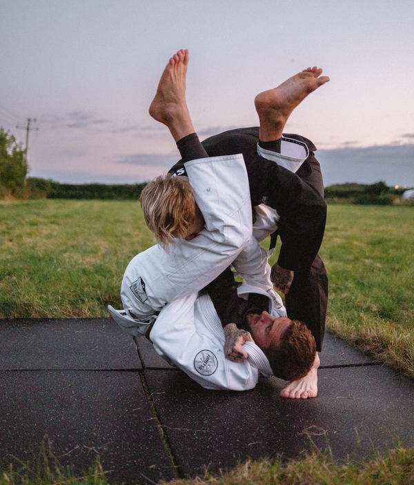 Two grapplers training in Fumetsu BJJ gis