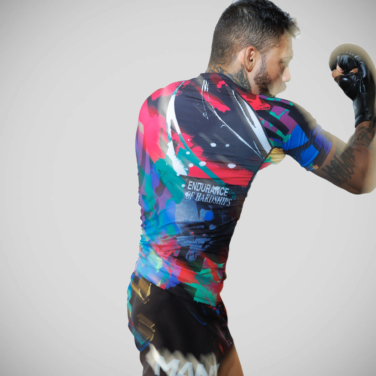 मंटो रेव रैश गार्ड मल्टीकोल