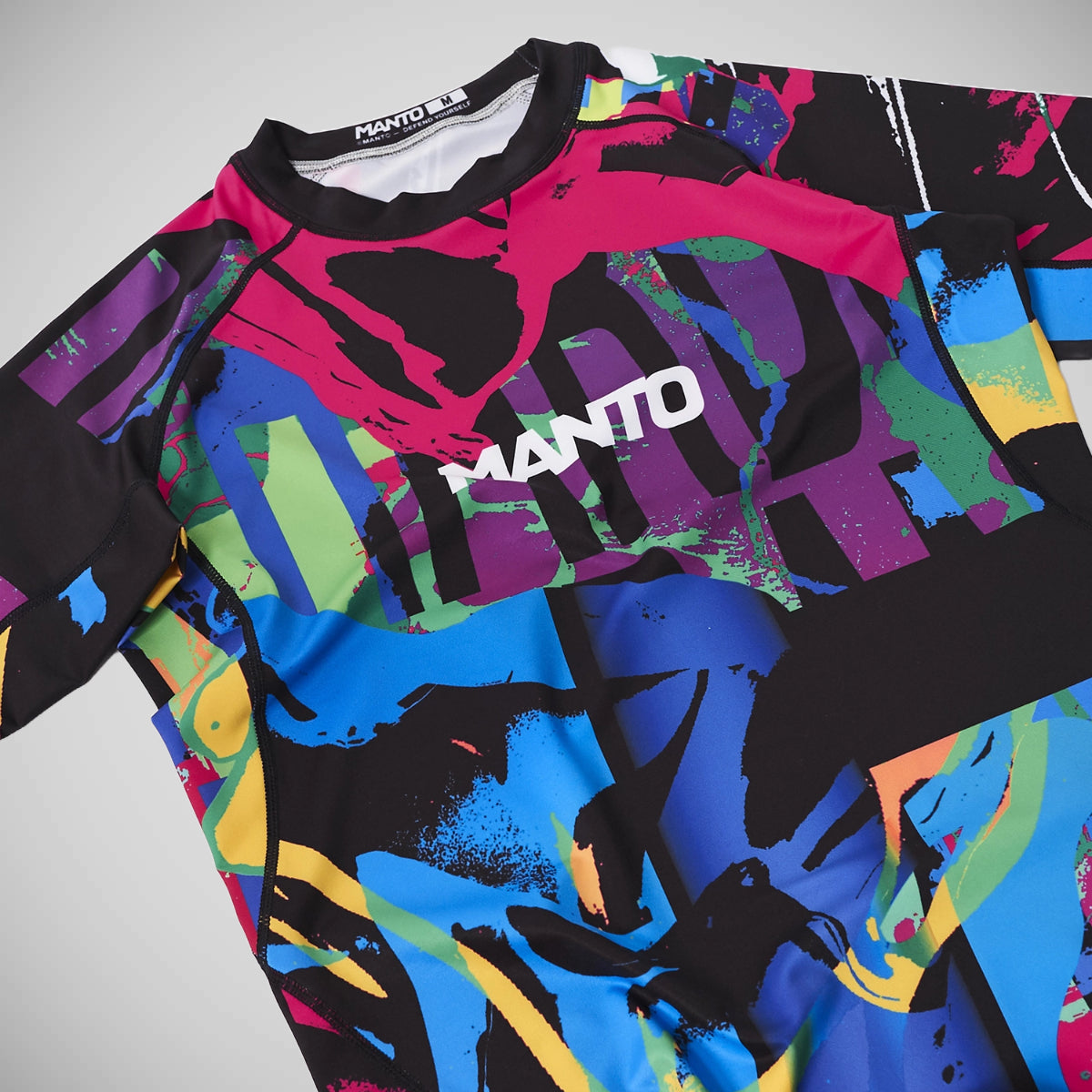 मंटो रेव रैश गार्ड मल्टीकोल