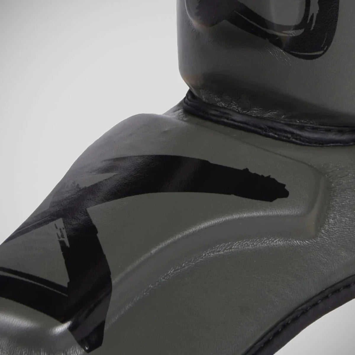 Olive/Black 8 Weapons Unlimited Shin Guards from Made4Fighters