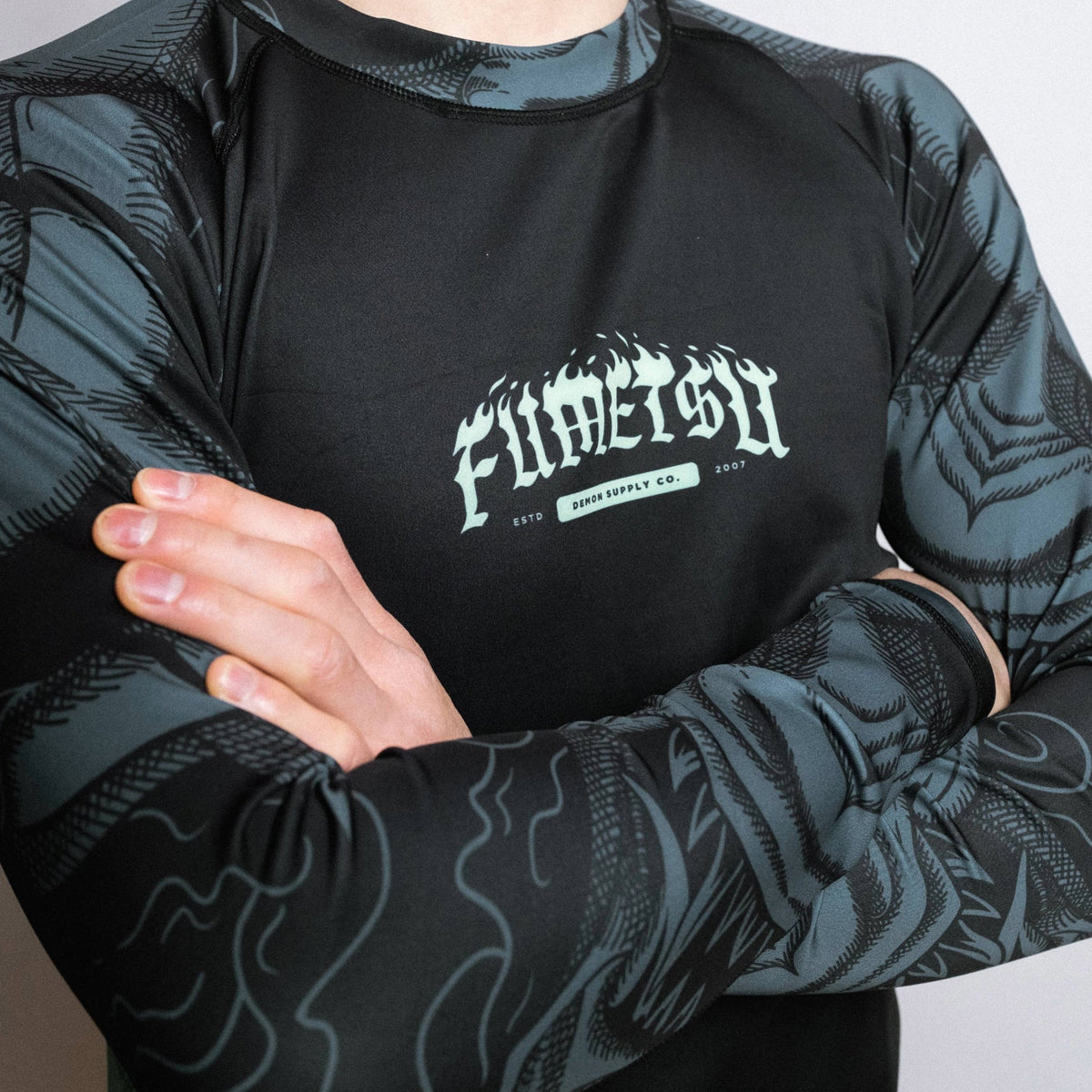 Mint Rash Guard Fumetsu Oni Long Sleeve Rash Guard Black/Blue/Mint from Made4Fighters