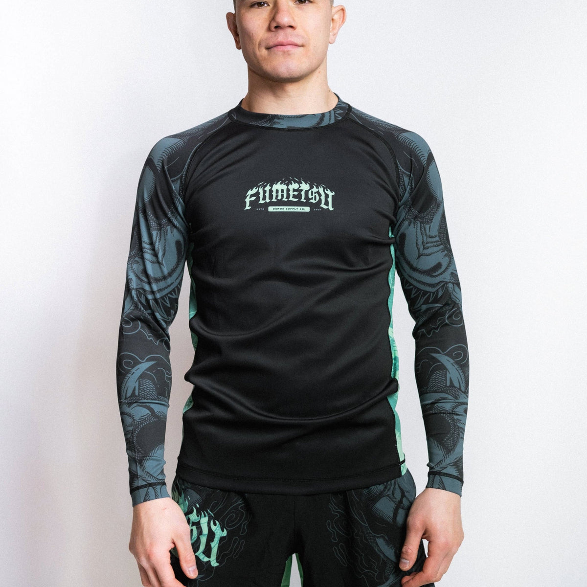 Mint Rash Guard Fumetsu Oni Long Sleeve Rash Guard Black/Blue/Mint from Made4Fighters