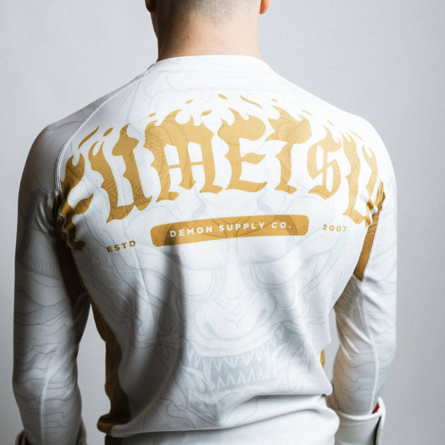 Fumetsu Oni Long Sleeve Rash Guard White/Gold/Grey