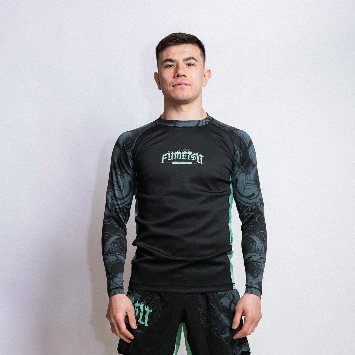 Mint Rash Guard Fumetsu Oni Long Sleeve Rash Guard Black/Blue/Mint from Made4Fighters