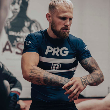 Прогресс ранжирует соревнование Rash Guard Blue
