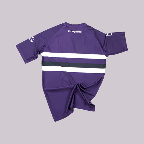 Прогресс ранжирует соревнование Rash Guard Purple