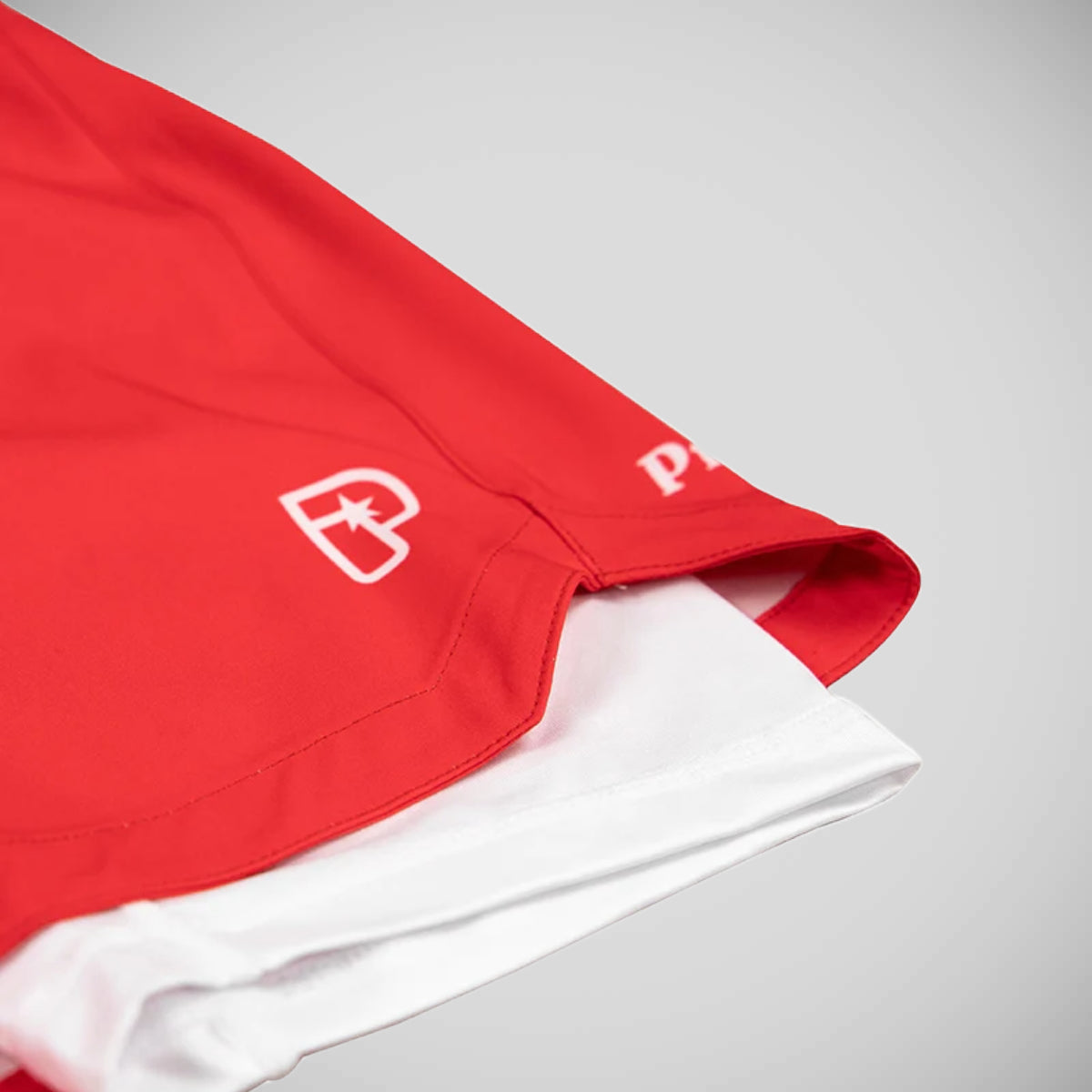 Fremdriftsprofil rød og hvit hybrid shorts rød/hvit