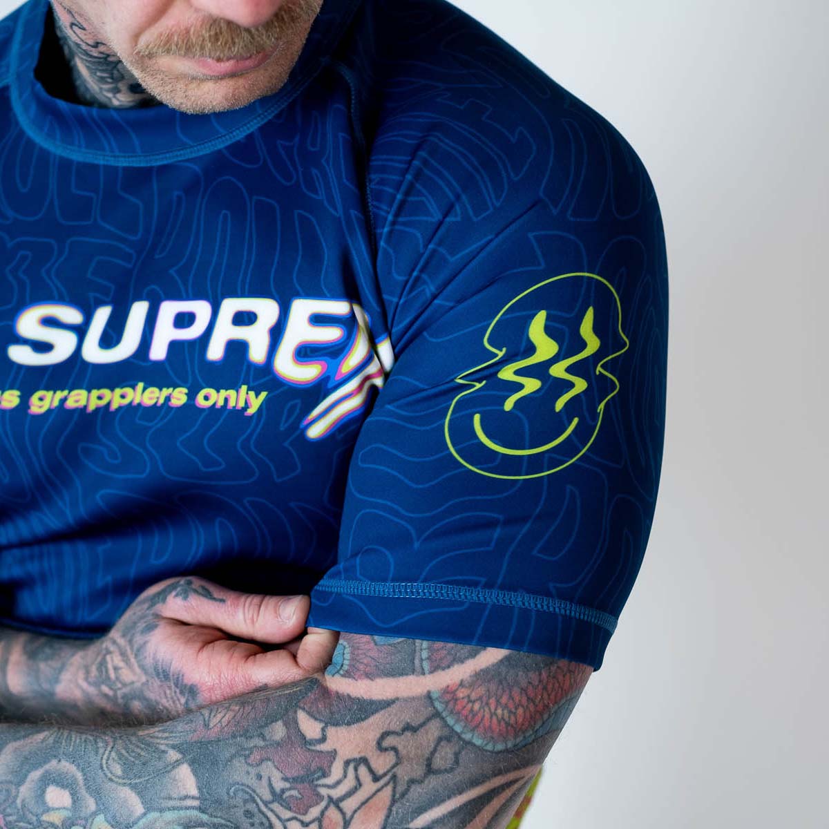 Roll Supreme The Rave Nuclear Candy Trip Trip Short Scoeve Rash Guard