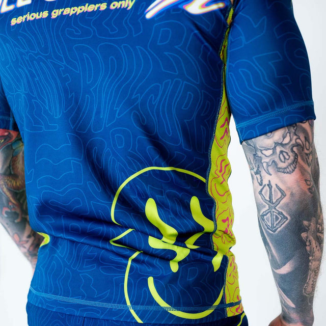 Roll Supreme  The Rave Nuclear Candy Trip Short Sleeve Rash Guard