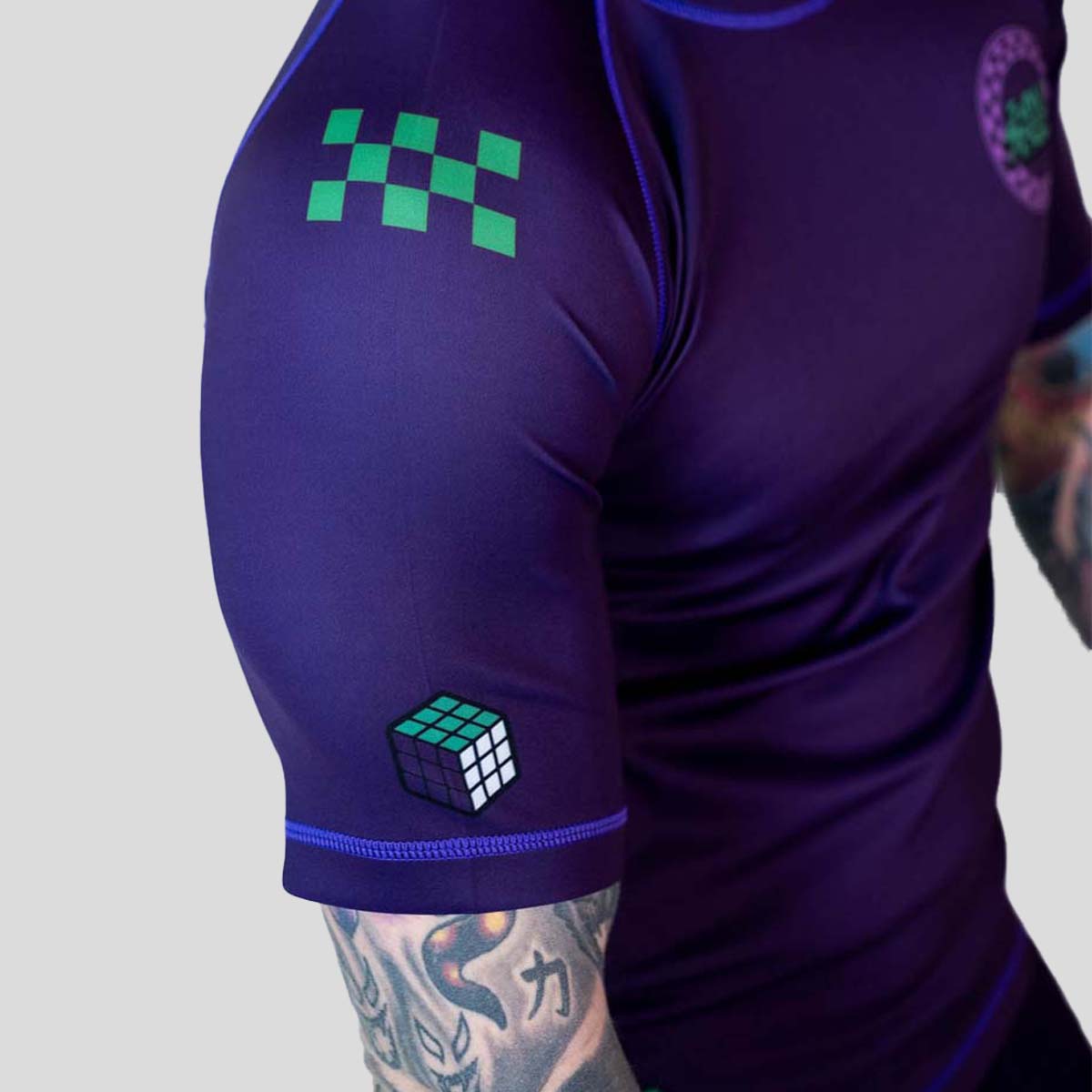 Finishers Rash Guard Roll Supreme The Finisher Short Sleeve Rash Guard Purple/Green from ...