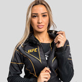 سترة بقلنسوة Venum UFC Authentic Fight Night 2.0 للسيدات باللون الأسود/الذهبي