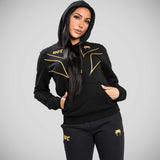 Venum UFC Fight Night 2.0 Réplica sudadera con capucha para mujeres negras/oro