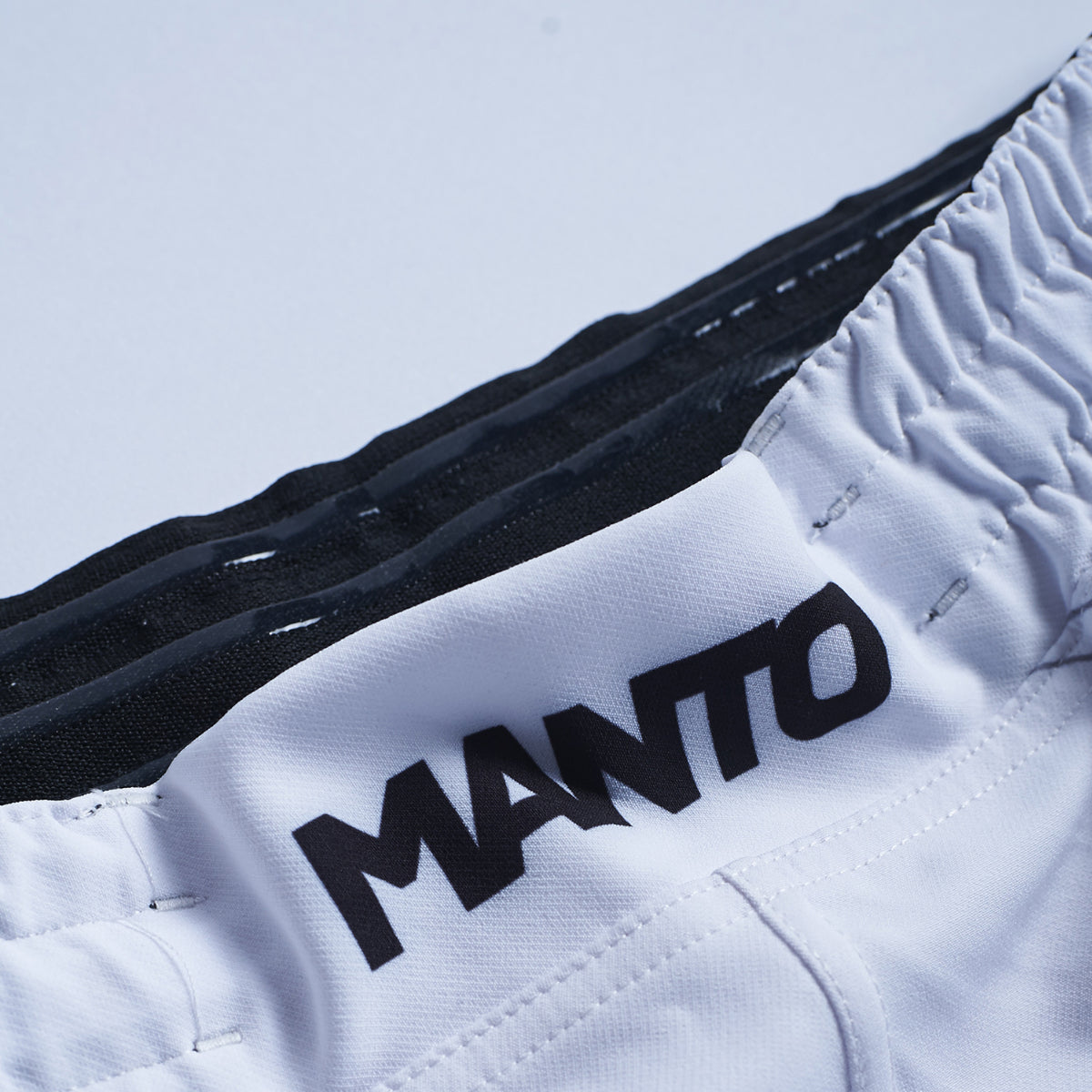 Shorts de luta de fluxo de Manto