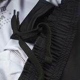 Shorts de luta essenciais do Manto Black