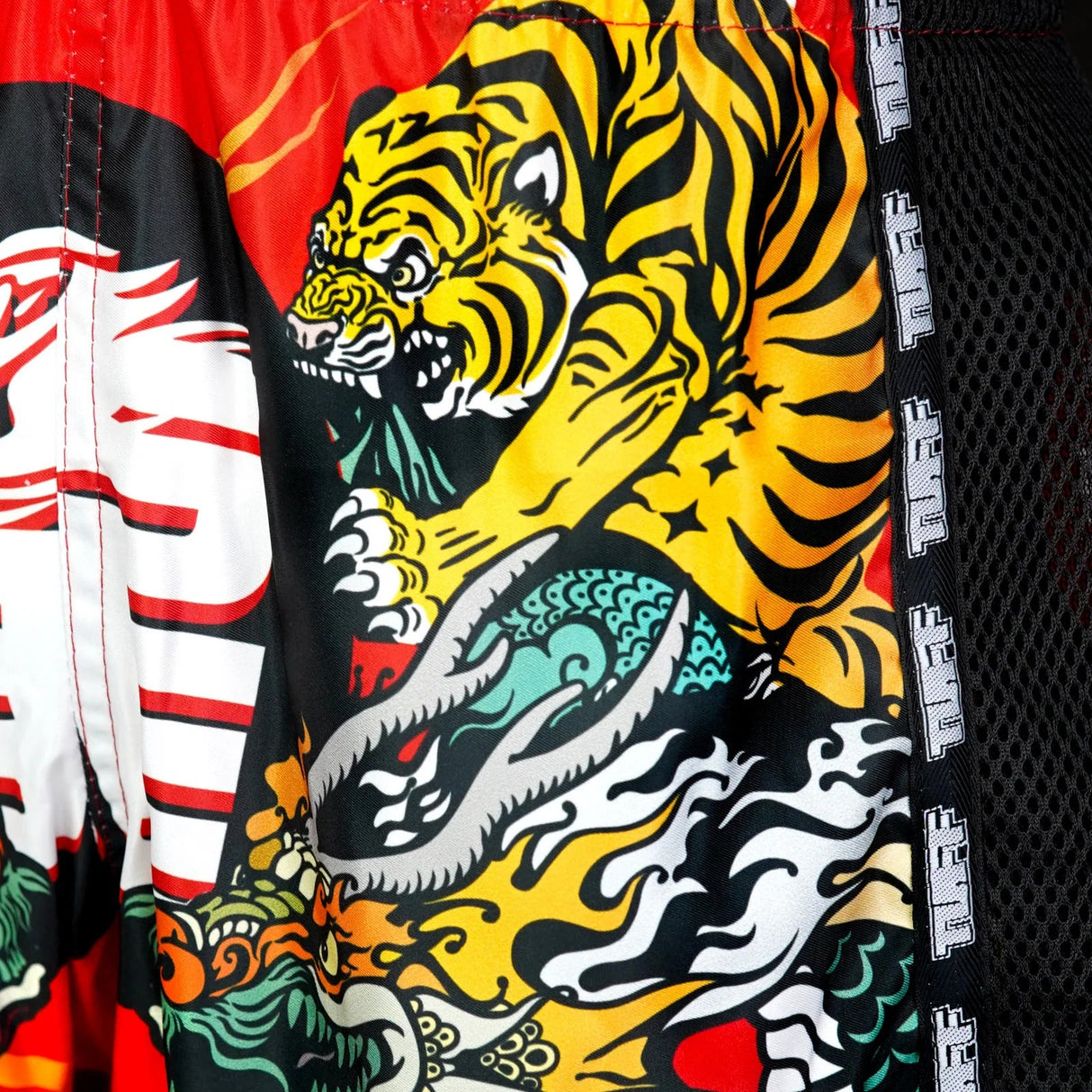 TUFF Sport MSC113 Chinese Dragon and Tiger Muay Thai Shorts Red - fit and cut detail