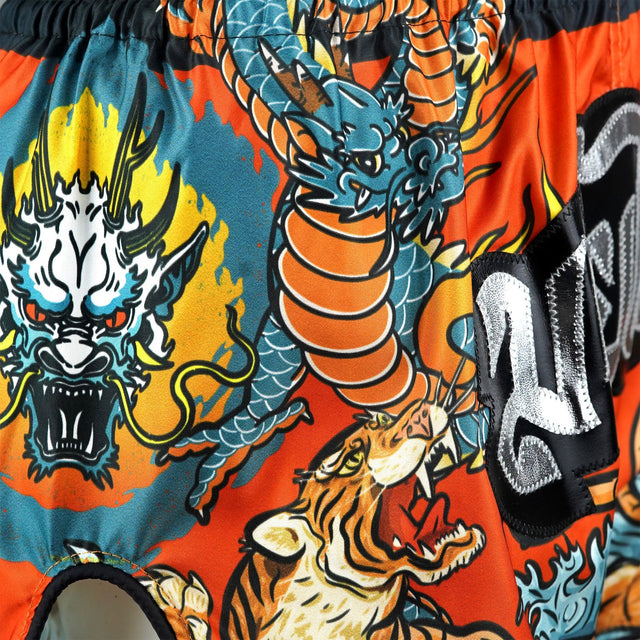 TUFF Sport RMS005 Payak The Eternal Duel Muay Thai Shorts Orange - fit and cut detail
