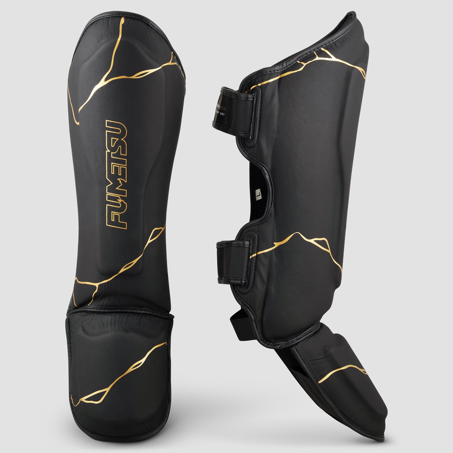 Fumetsu Kintsugi Shin/Instep Guards Black/Gold from Made4Fighters