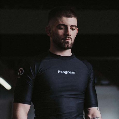 Black Progress Academy Rash Guard   