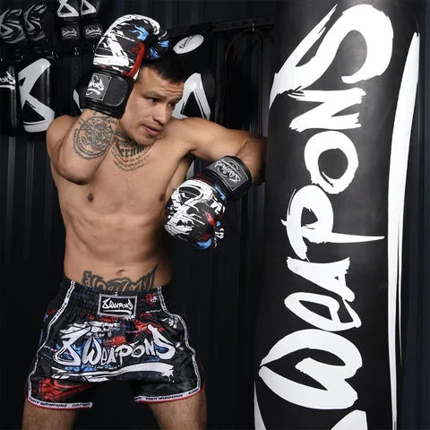 Athlete training with 8 Weapons boxing gloves
