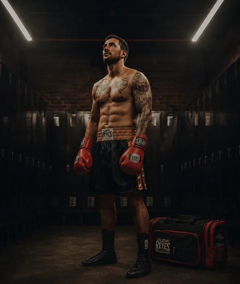 Boxer wearing Cleto Reyes gloves in the gym